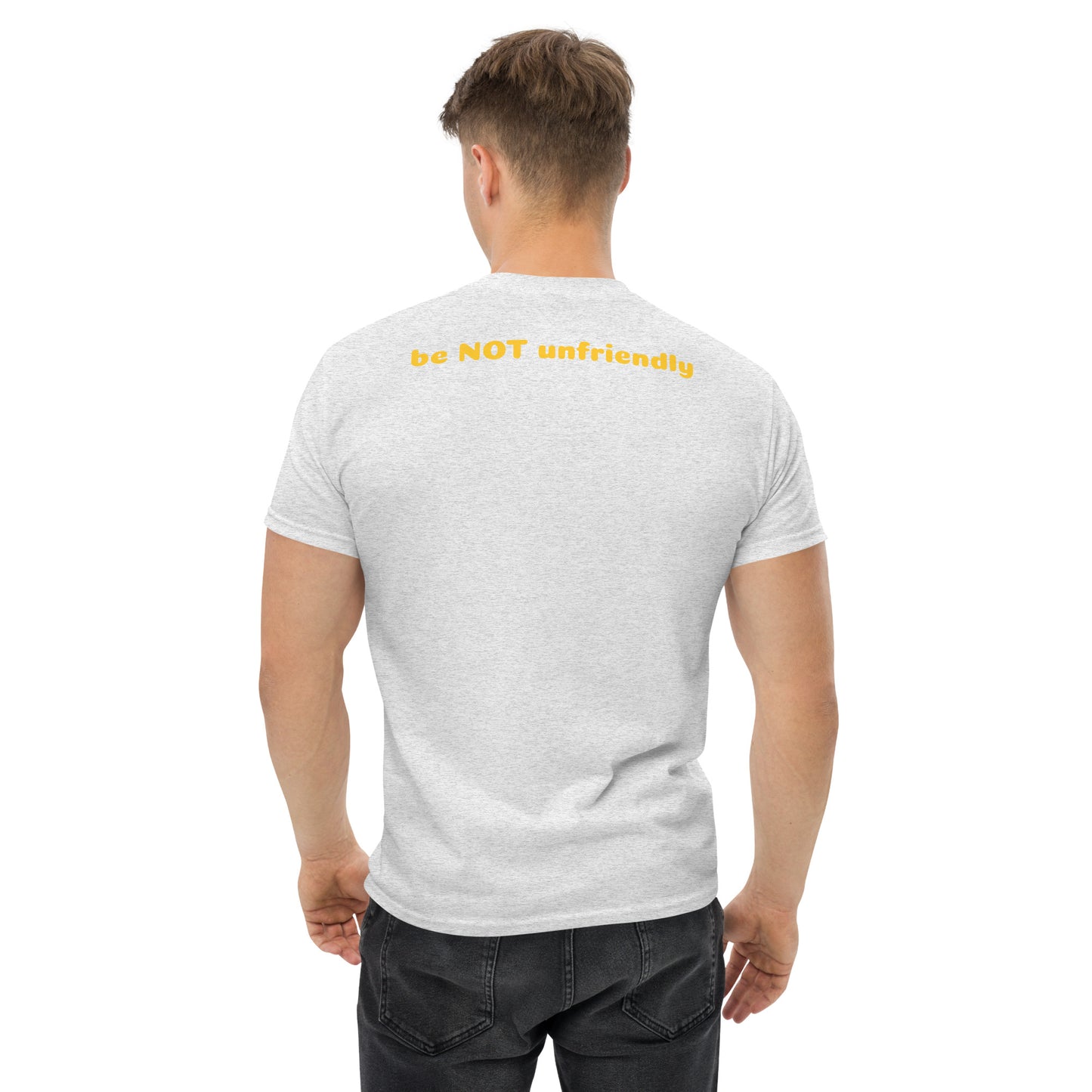 Man wearing an ash gray t-shirt with a text on the back, standing against a white background