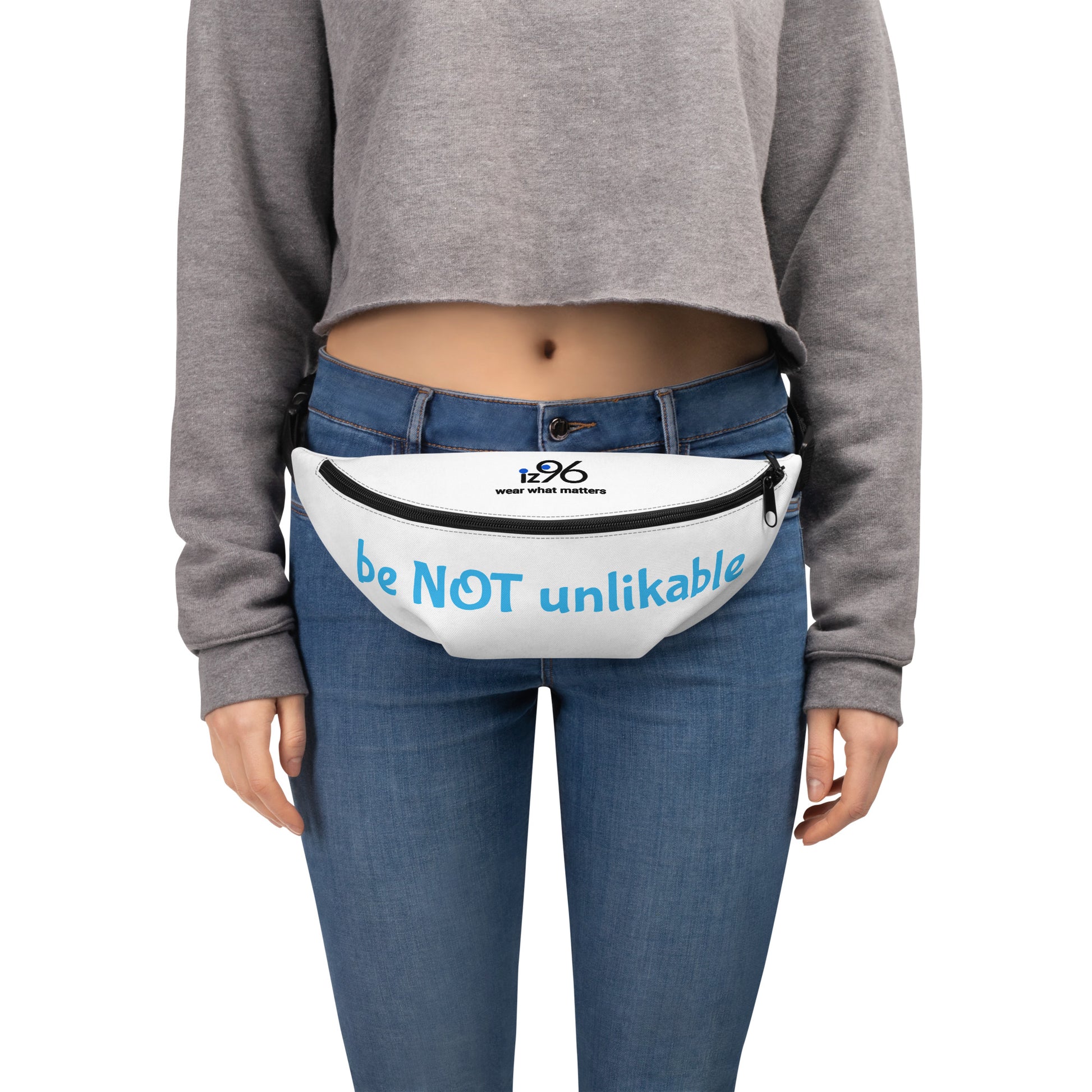 Person wearing a patterned fanny pack on a white background