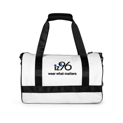 White duffel bag with black straps with 'iz96 wear what matters' brand on a white background