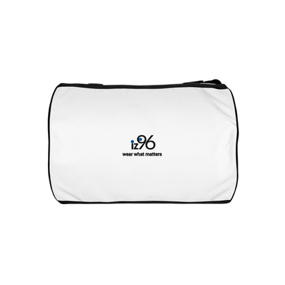 Person holding a white duffel bag with 'iz96' branding on a white background