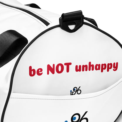 Person holding a white duffel bag with 'be not unhappy' branding on a white background