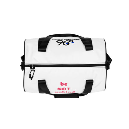Person holding a white duffel bag with 'iz96' branding on a white background