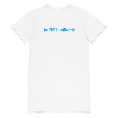 White t-shirt with 'be NOT unlikable' text on the back against a white background