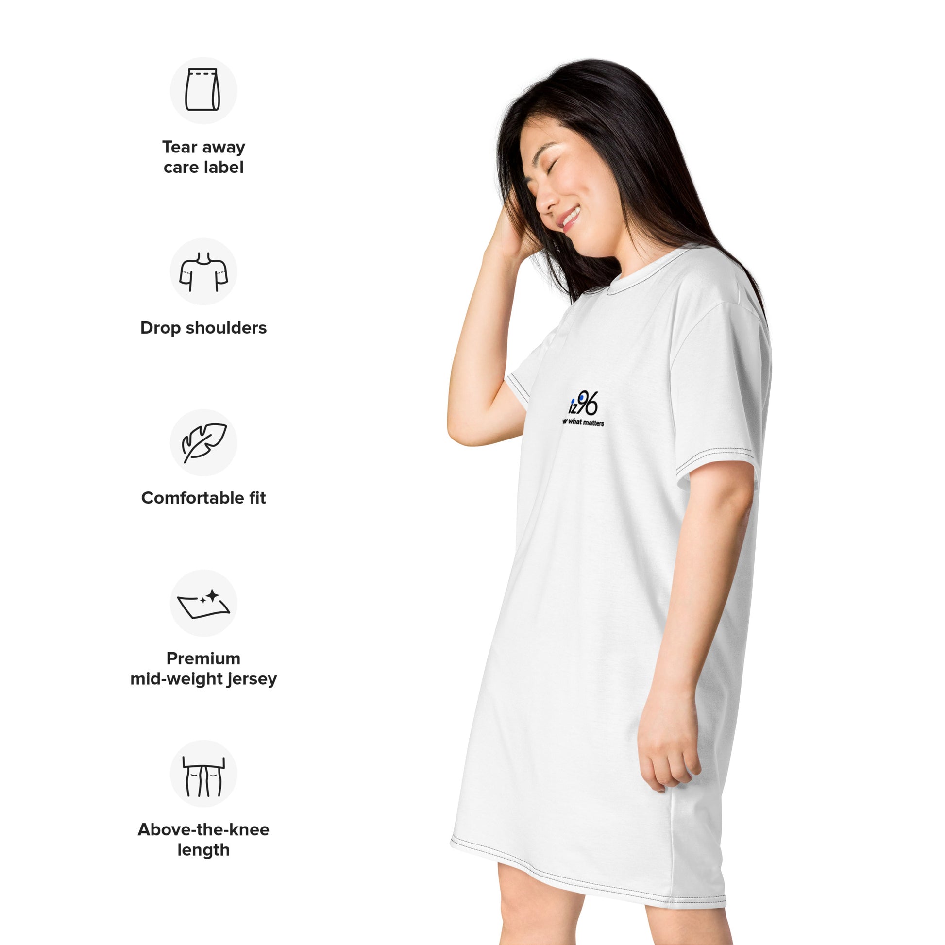 Woman wearing a white t-shirt dress with logo
