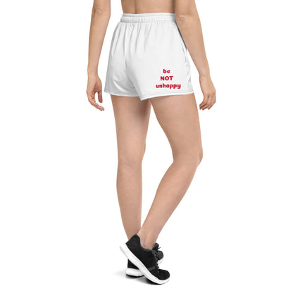 White shorts with red text worn by a person on a white background