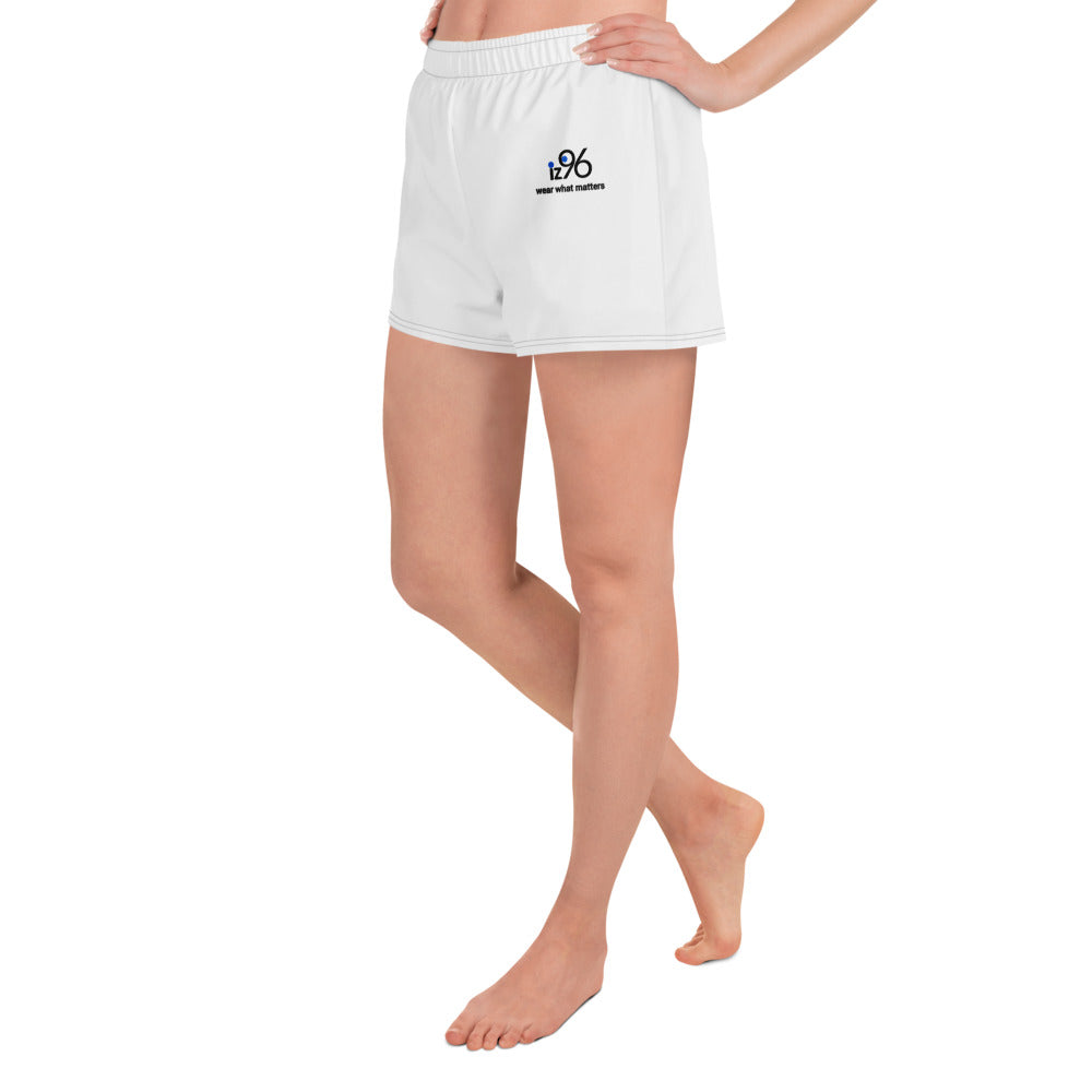 White shorts with a logo worn by a person on a white background