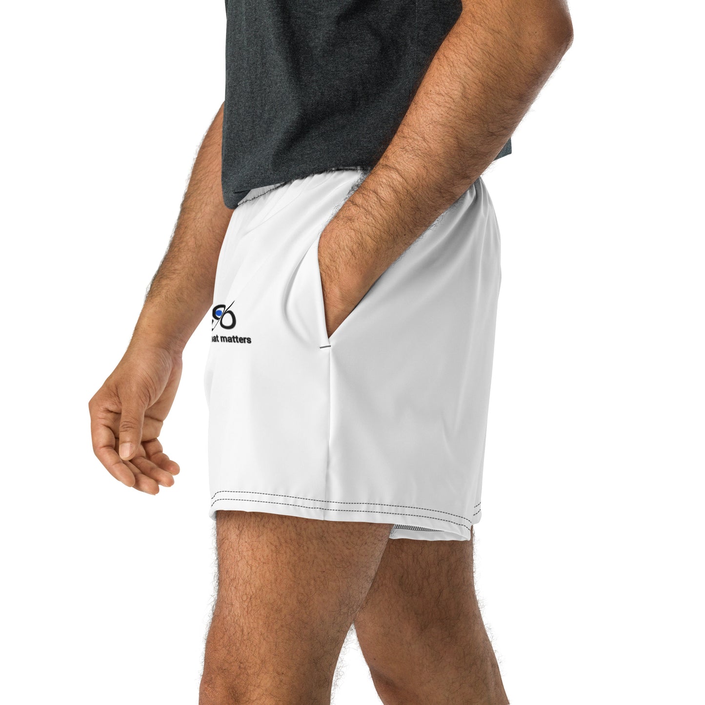 White shorts with a brand logo worn by a person on a white background