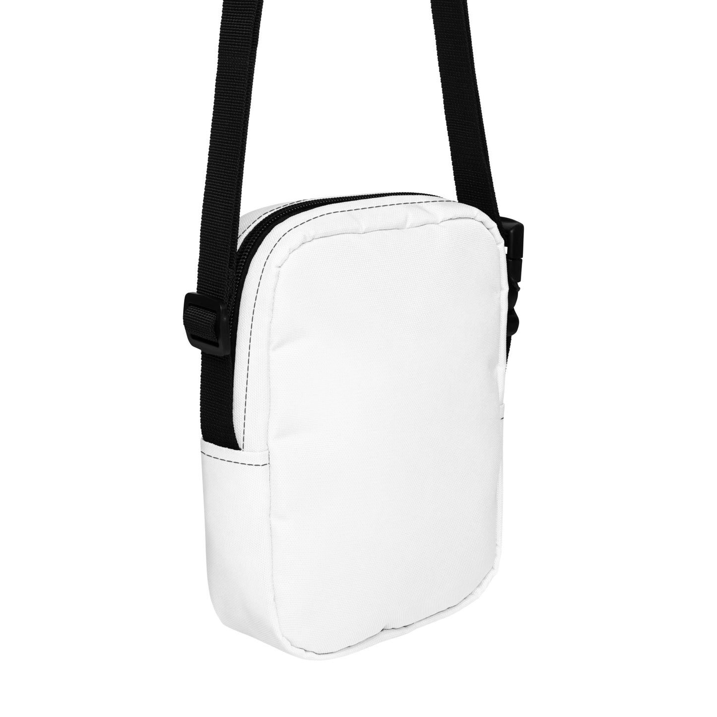 White crossbody bag with a black strap on a white background
