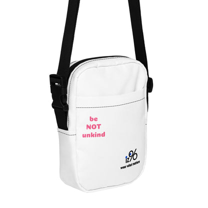 White shoulder bag with motivational text and a logo on a white background