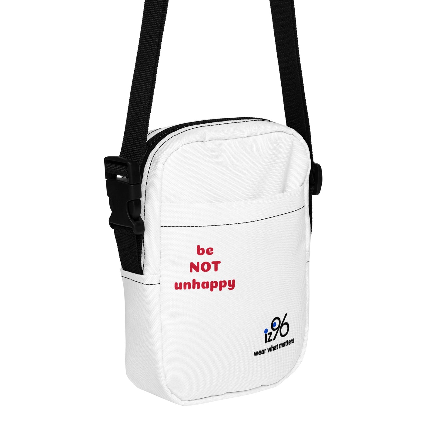 White shoulder bag with motivational text and a logo on a white background