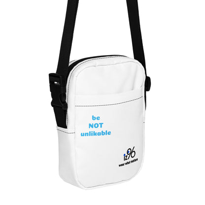 White shoulder bag with text and logo on a white background