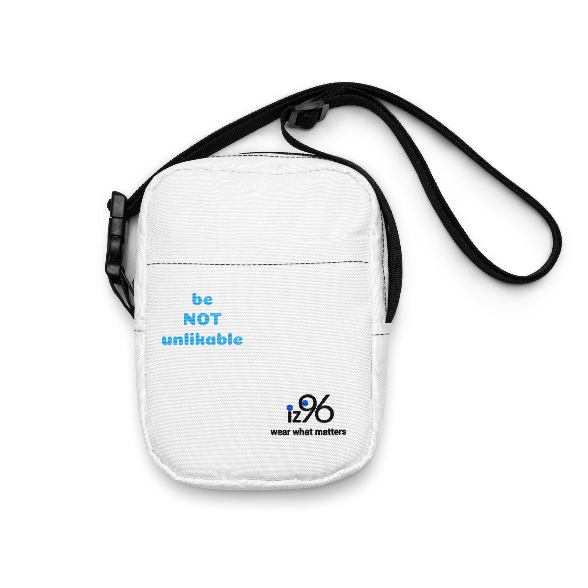 White crossbody bag with 'be NOT unlikable' text and iz96 logo on a white background