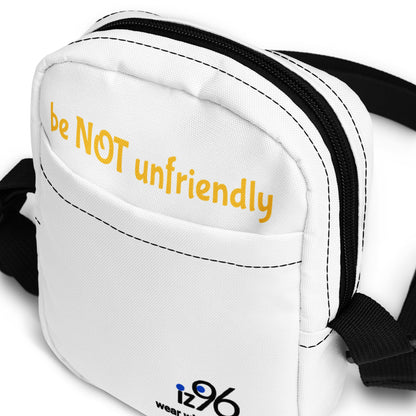 White waist bag with yellow text 'be NOT unfriendly' and black strap on a white background