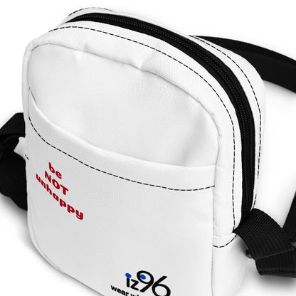 White waist bag with black strap and text 'be NOT unhappy' on a white background