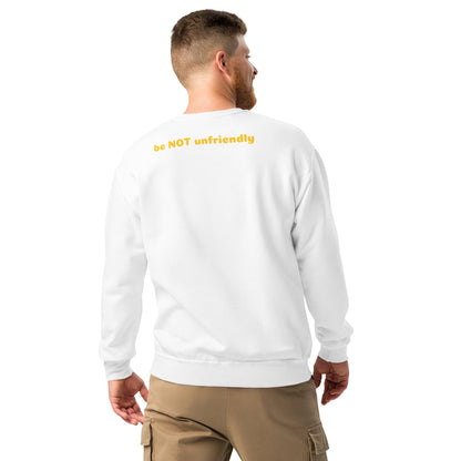 Man wearing a white sweatshirt with yellow text on the back, standing against a white background