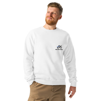 Man wearing a white sweatshirt with a logo on a white background