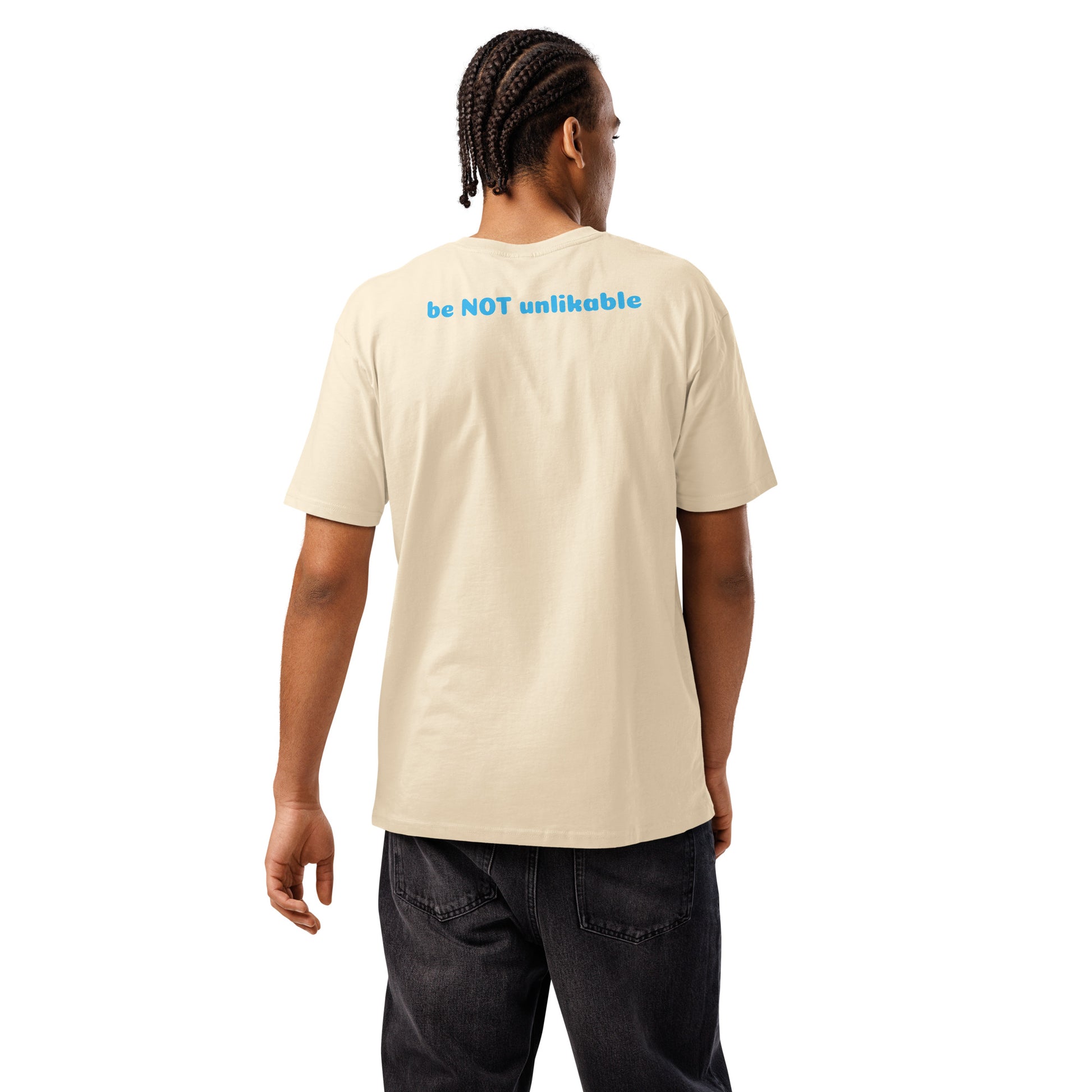 Person wearing a vintage white t-shirt with text on the back, standing against a white background