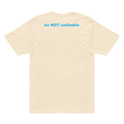 vintage white t-shirt with 'be NOT unlikable' text on a white background
