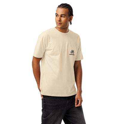 Man wearing a vintage white t-shirt with a small design on a white background