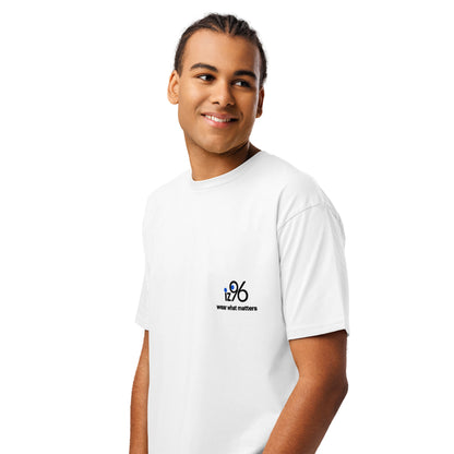 Person wearing a white t-shirt with a logo and text on a white background