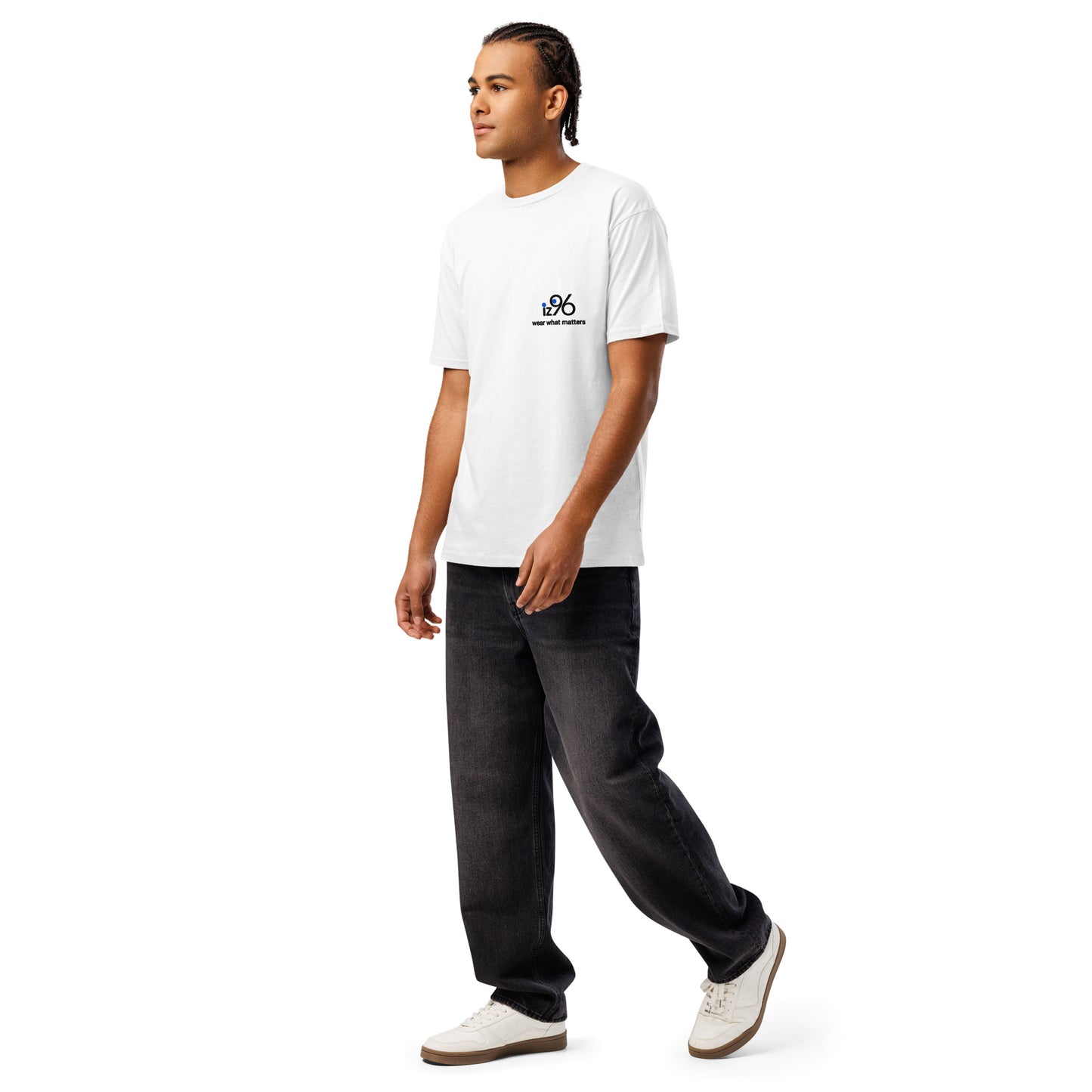 Person wearing a white t-shirt with a graphic design logo on a white background