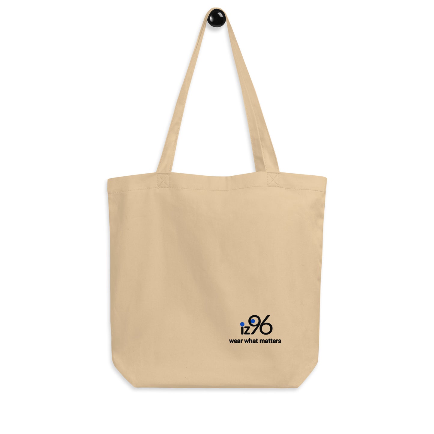 Beige tote bag with a logo and text on a white background