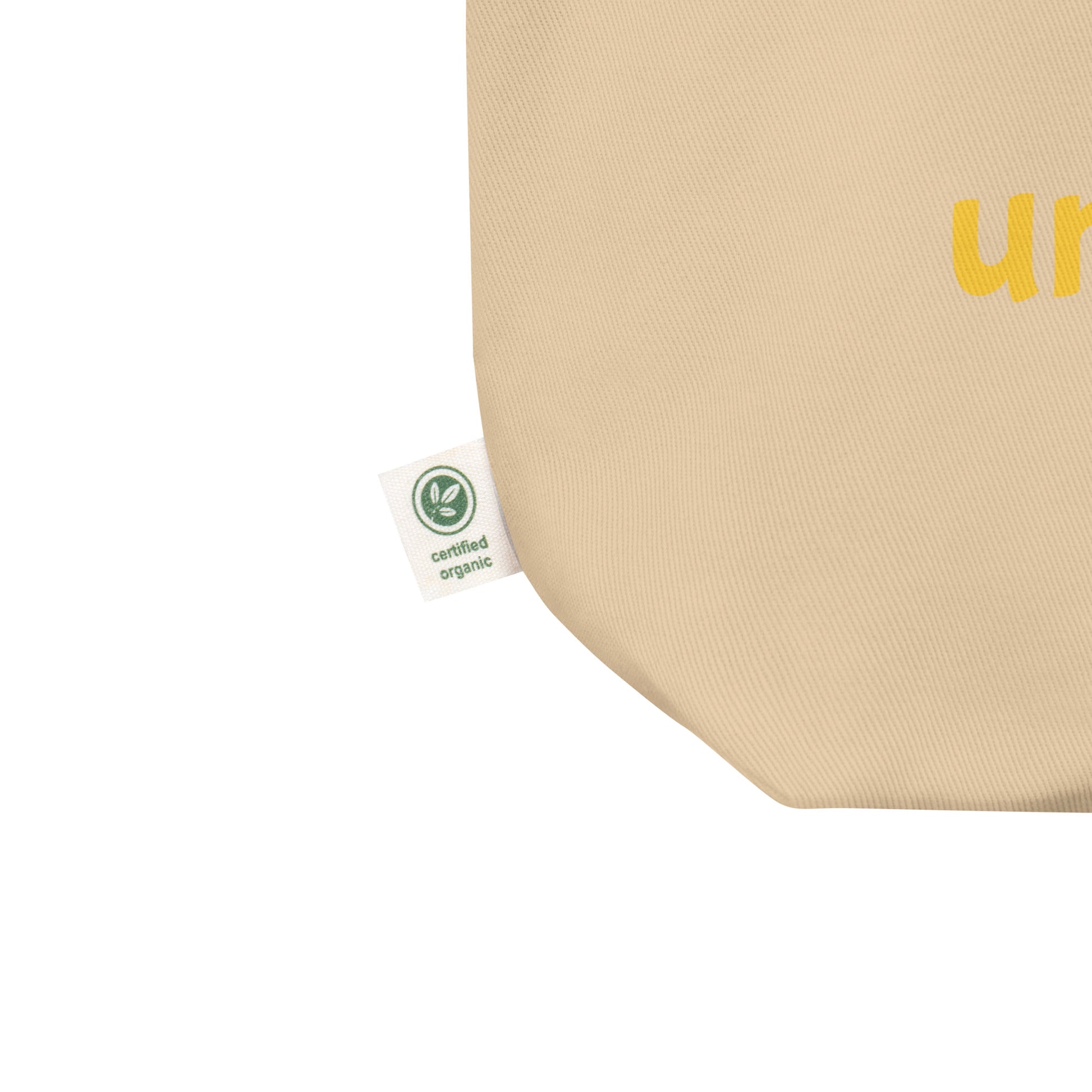 Beige product with a green organic certification label on a white background