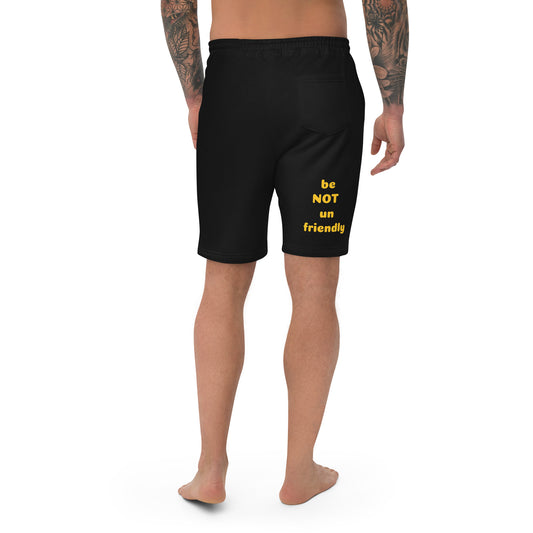 Black shorts with yellow text on a white background