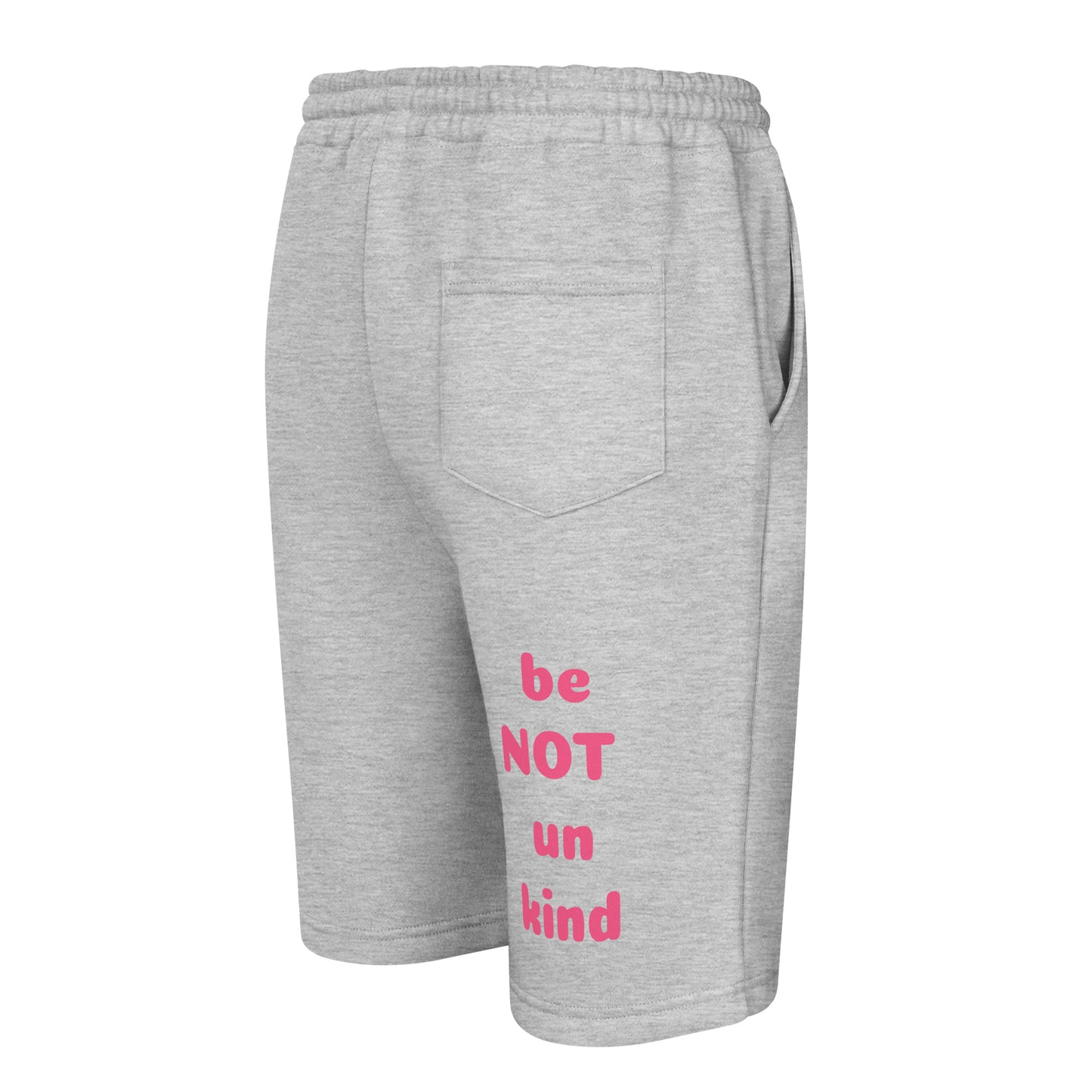Gray shorts with pink text 'be NOT un kind' on a white background