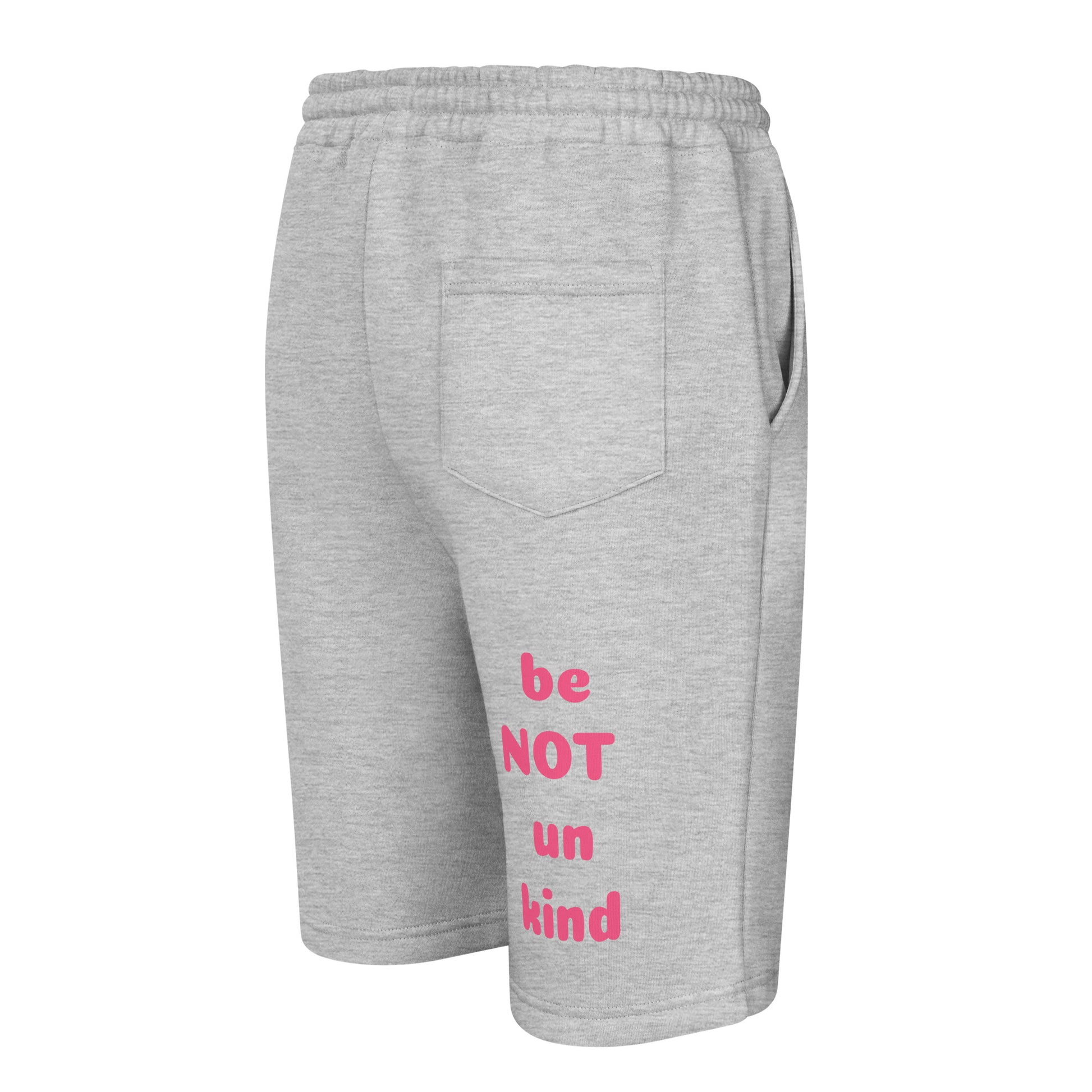 Gray shorts with pink text 'be NOT un kind' on a white background