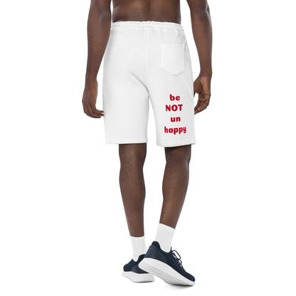 White shorts with red text worn by a person on a white background