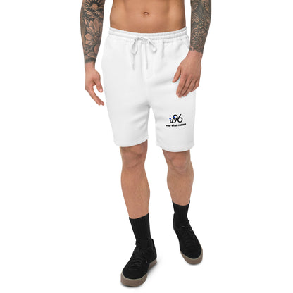 Person wearing white shorts on a white background