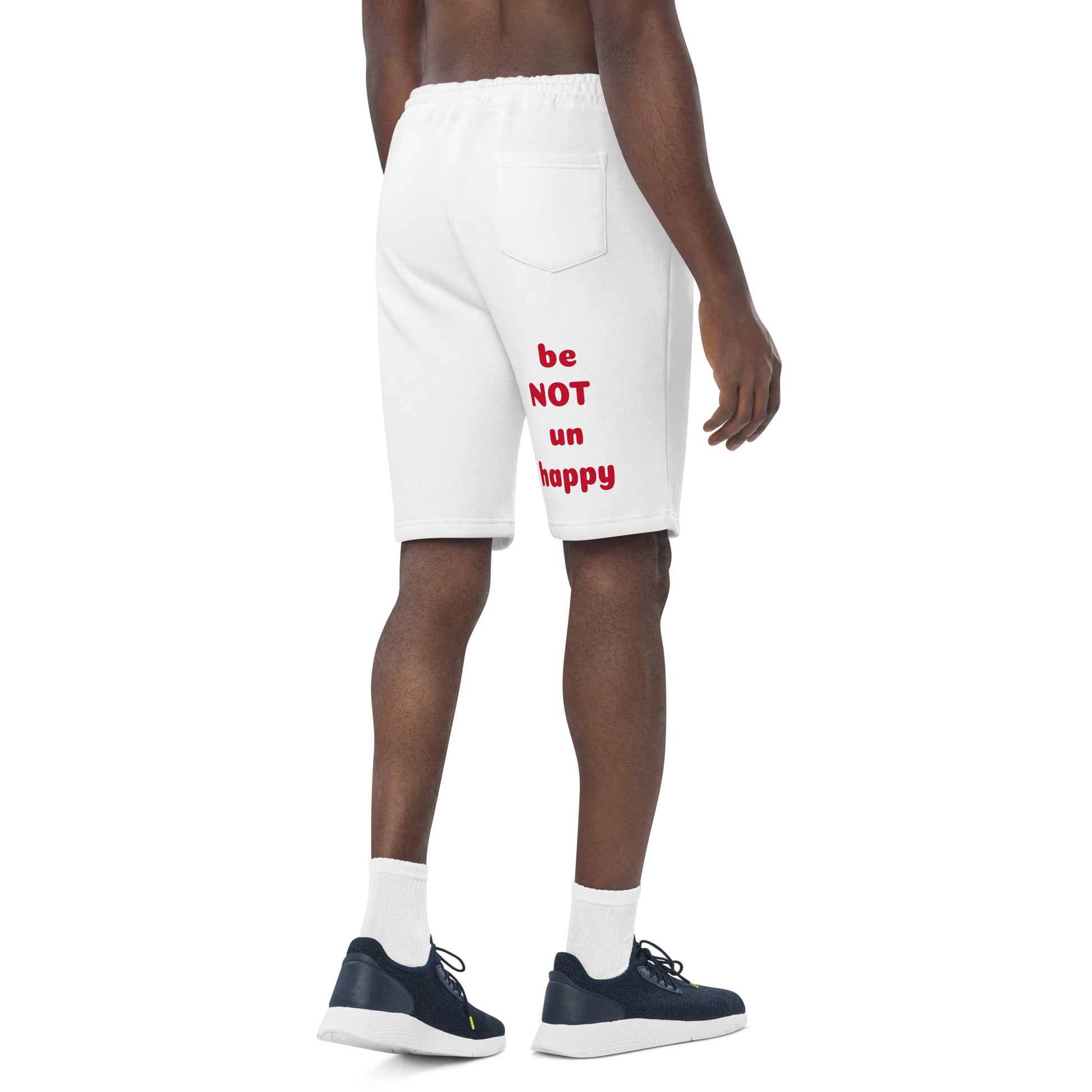 White shorts with red text worn by a person on a white background