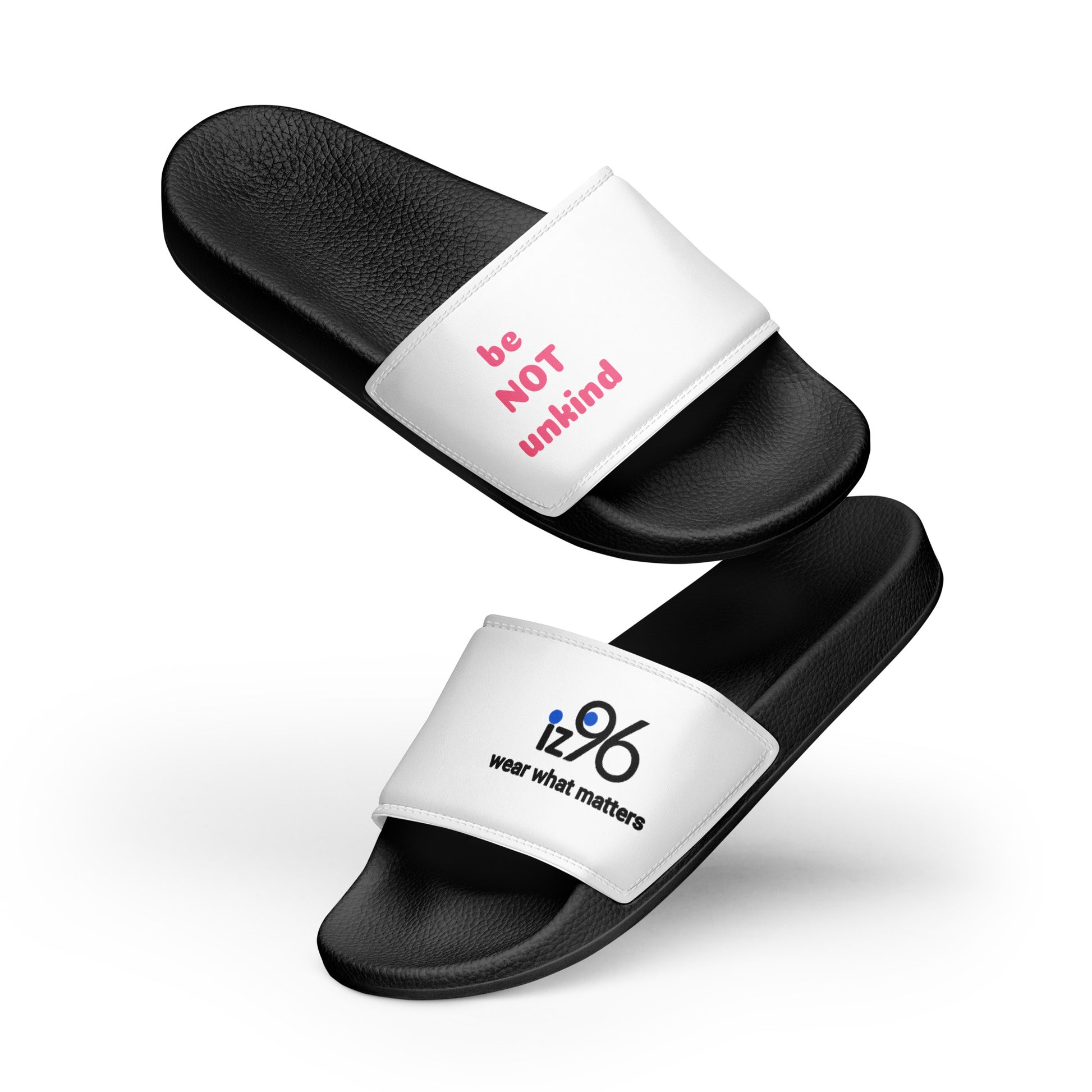 Black slides with white straps featuring text on a white background