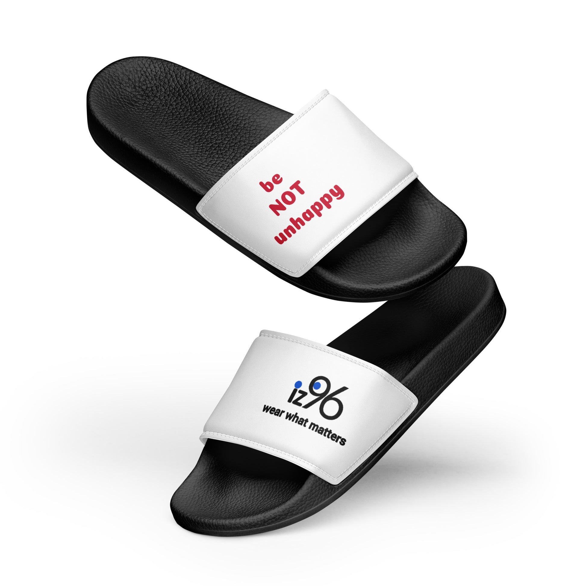 Black slides with white straps featuring text on a white background