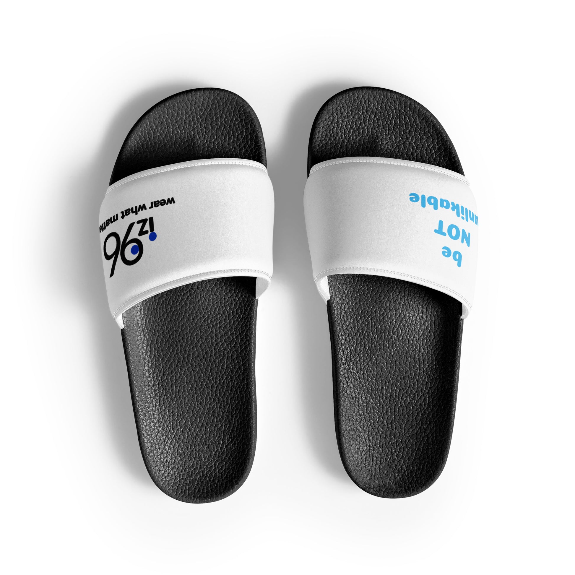 Black slides with white straps featuring text on a white background