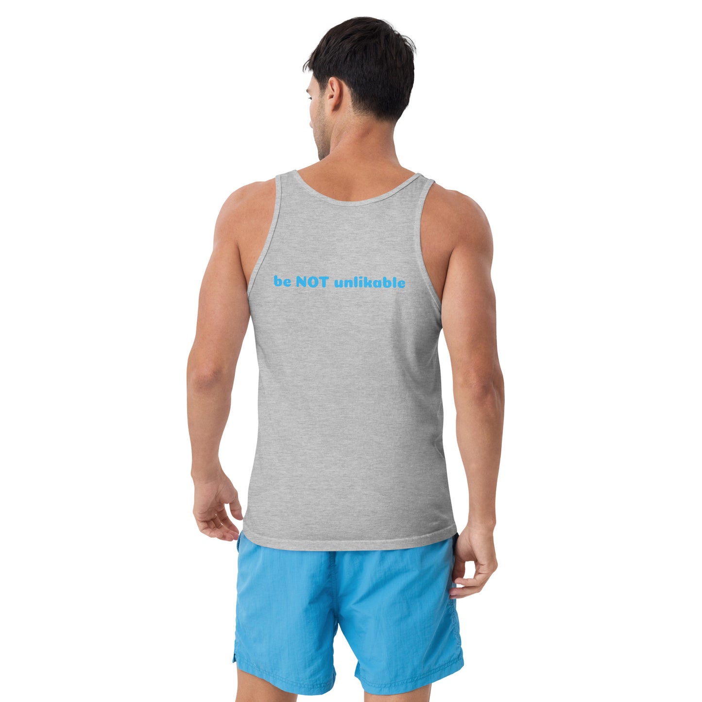 Man wearing a gray tank top and blue shorts on a white background