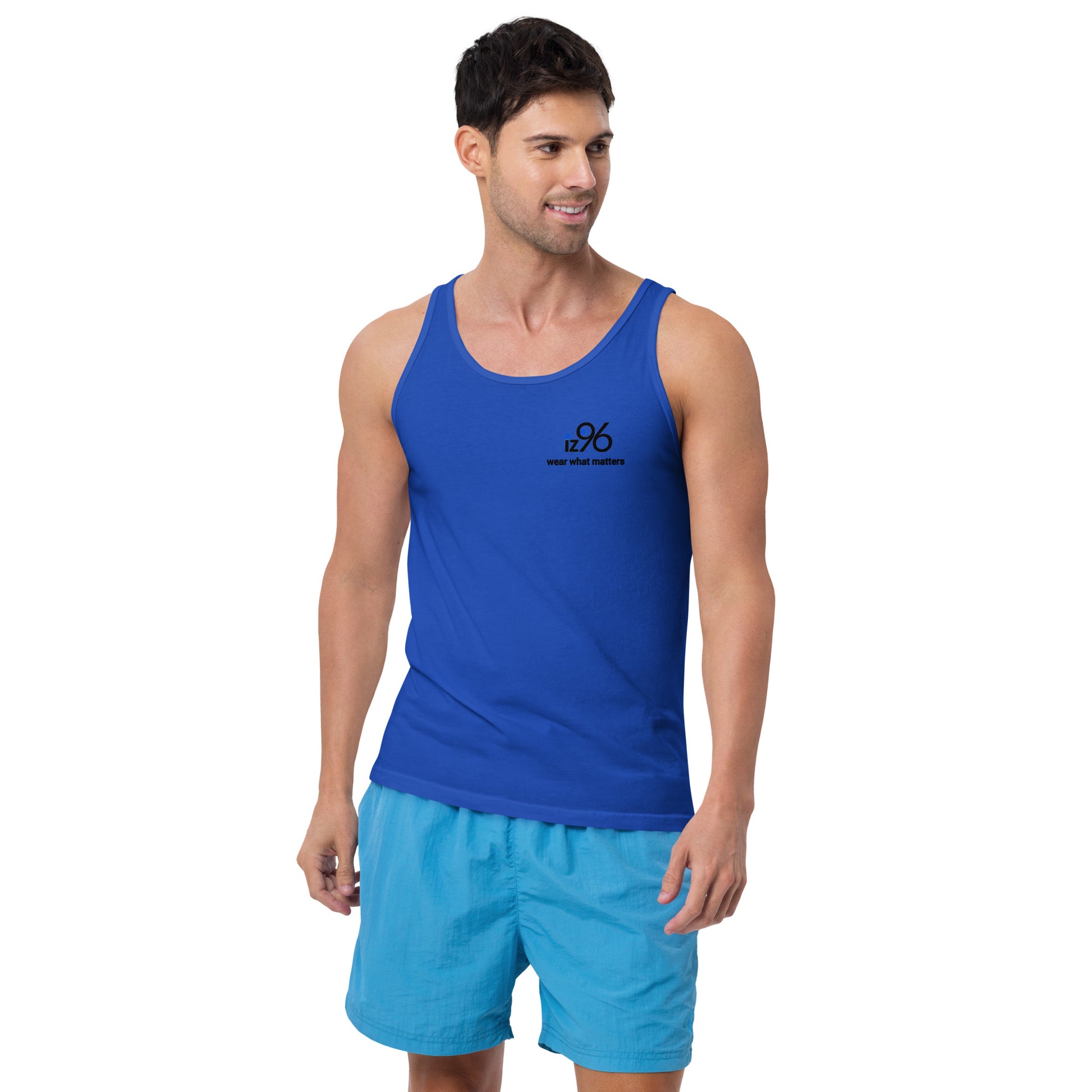Man wearing a blue tank top and shorts on a white background