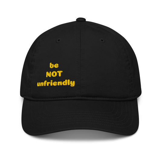 Black cap with yellow text 'be NOT unfriendly' on a white background