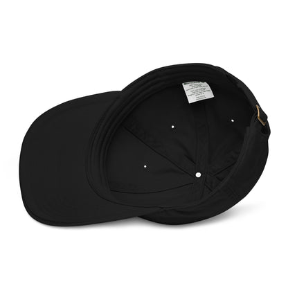 Black cap with a visible brand label on a white background