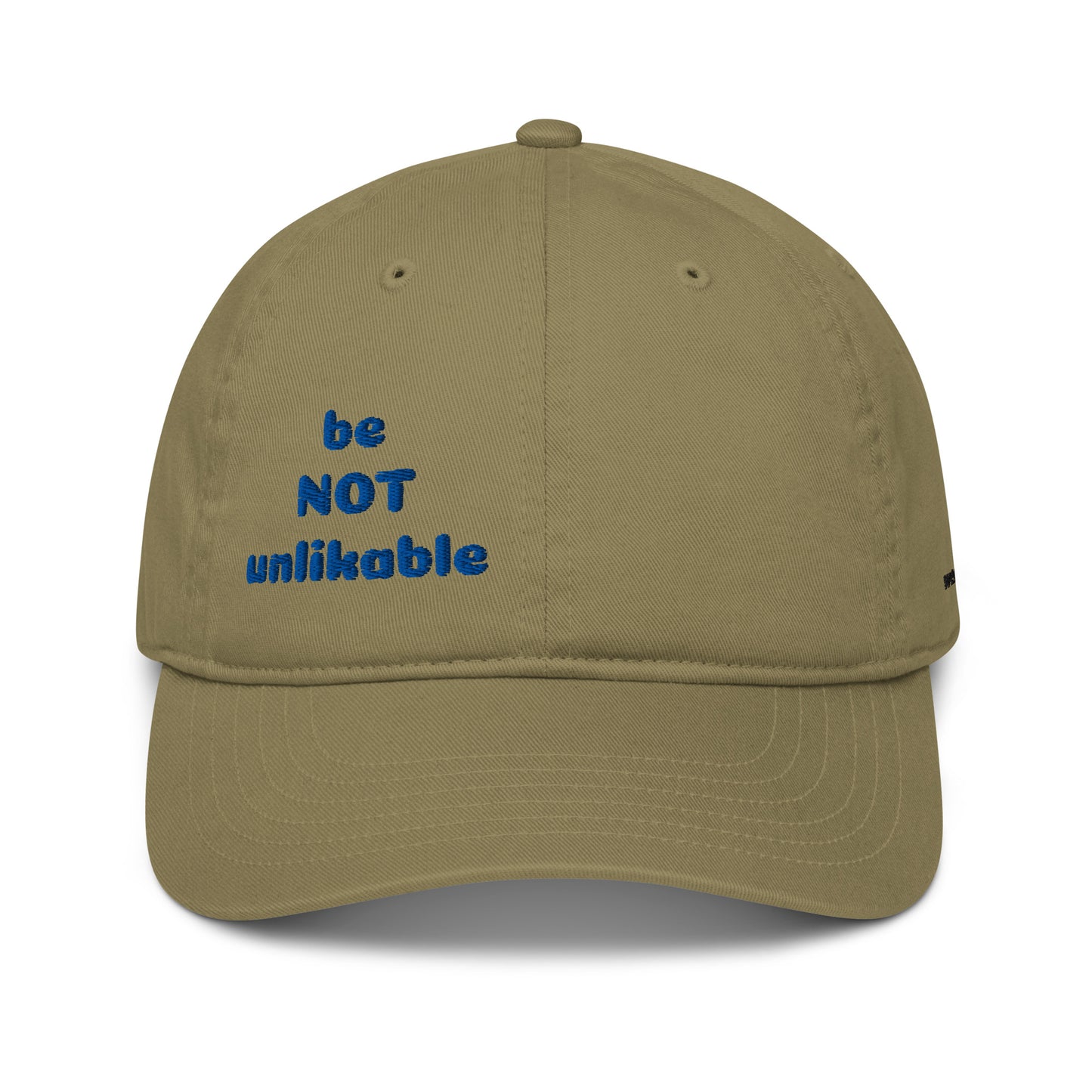 Khaki cap with 'be NOT unlikable' text in blue on a white background