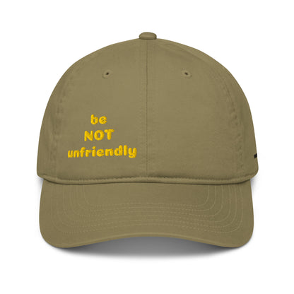 Khaki cap with yellow text 'be NOT unfriendly' on a white background