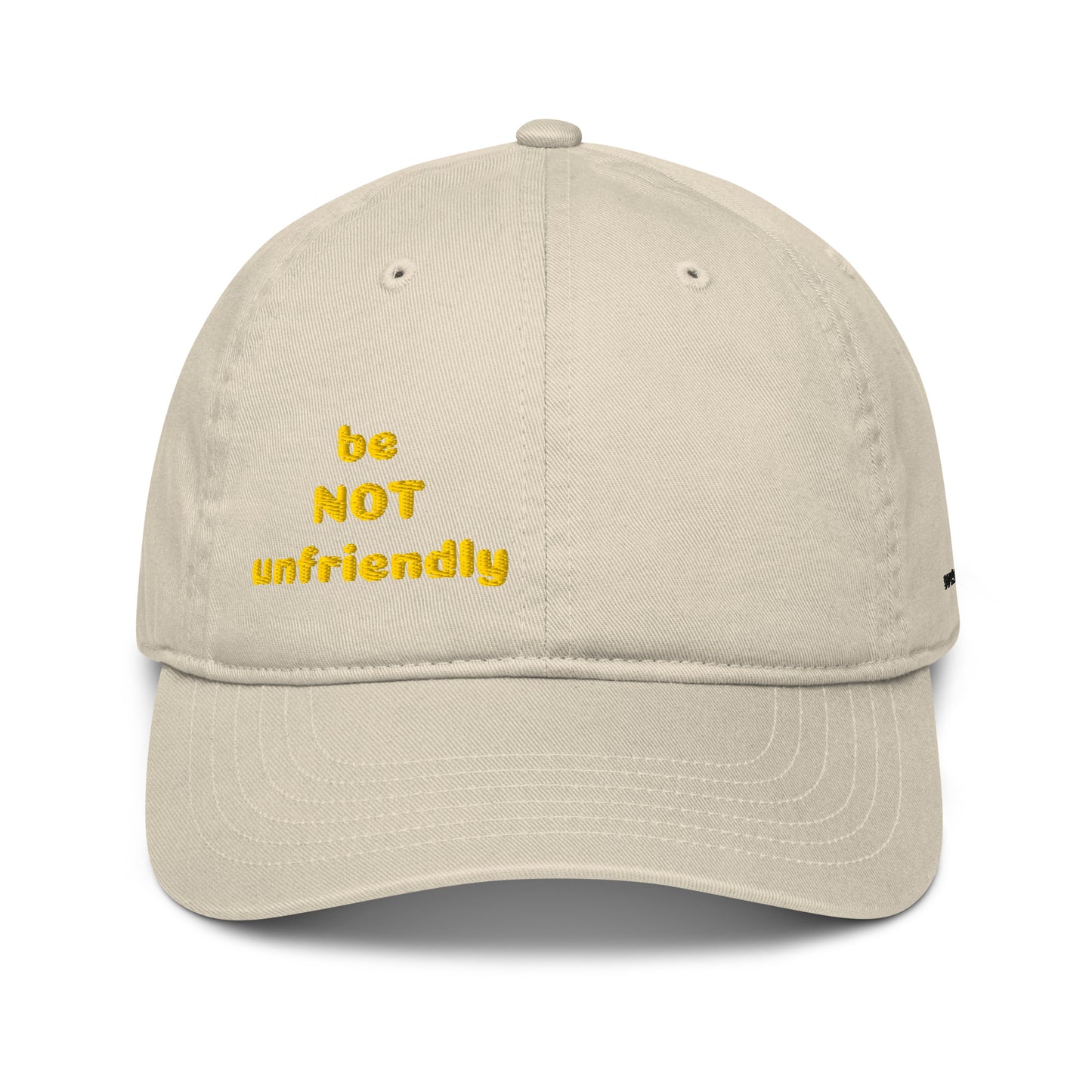 Beige cap with yellow text 'be NOT unfriendly' on a white background
