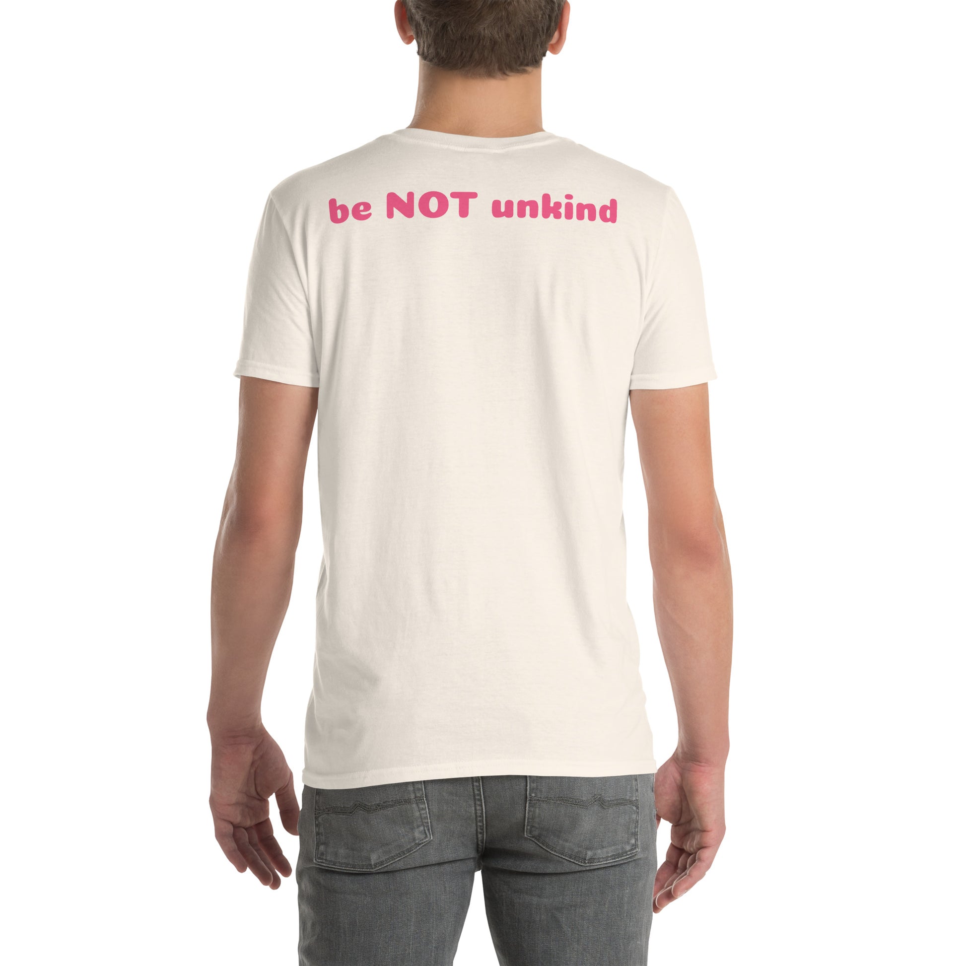 Person wearing a white t-shirt with text, standing against a white background