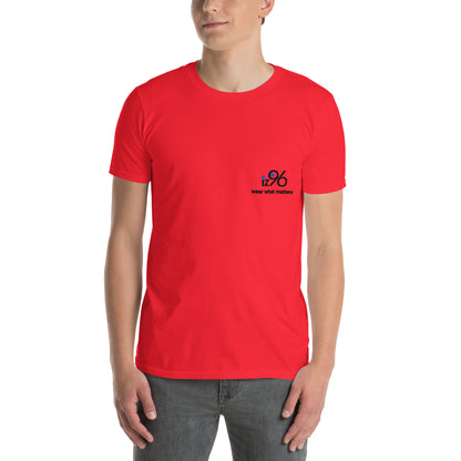 Person wearing a red t-shirt with a logo on the chest against a white background