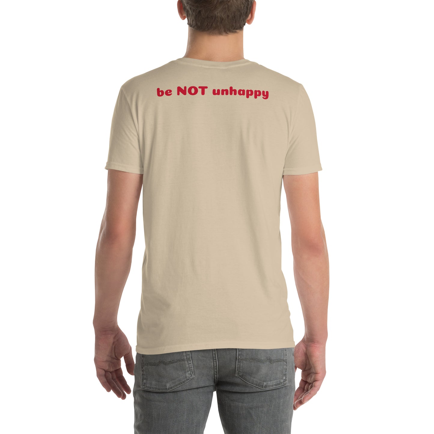 Person wearing a sand t-shirt with 'be NOT unhappy' text on the back, standing against a white background.