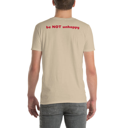 Person wearing a sand t-shirt with 'be NOT unhappy' text on the back, standing against a white background.