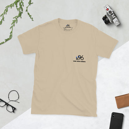 Beige t-shirt with a logo on a light gray background