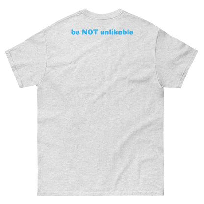 ash gray t-shirt with 'be NOT unlikable' text on the back against a white background