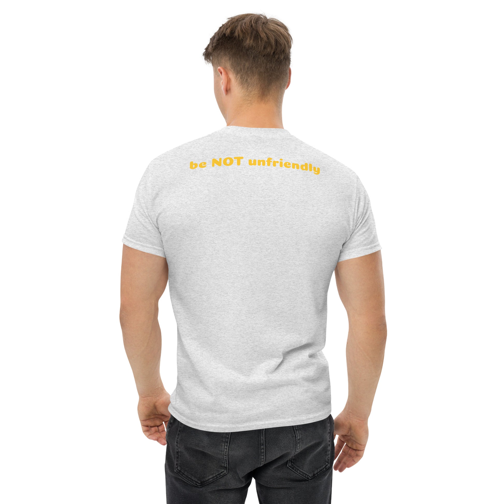 Man wearing an ash gray t-shirt with a text on the back, standing against a white background